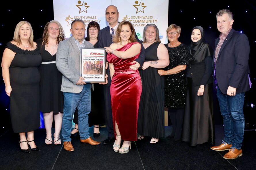 Bryngwyn Surgery team accepting Best GP Practice Award 2025, presented by South Wales Hearing Health